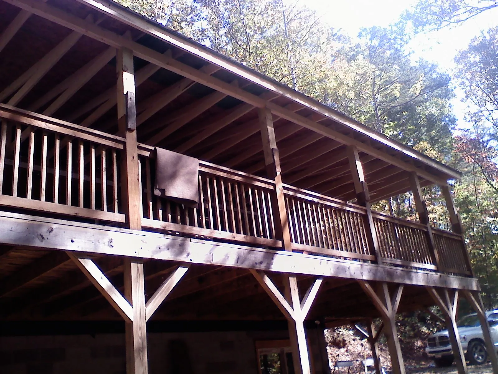 Timber framing under a new elevated porch and deck — Roof Leak Repair in Niagara by Roofing Brothers